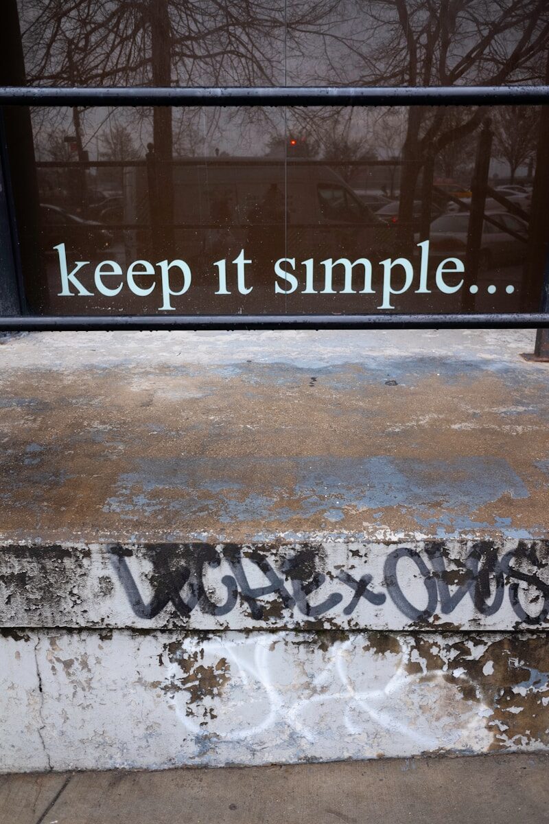 Text on glass reads keep it simple...